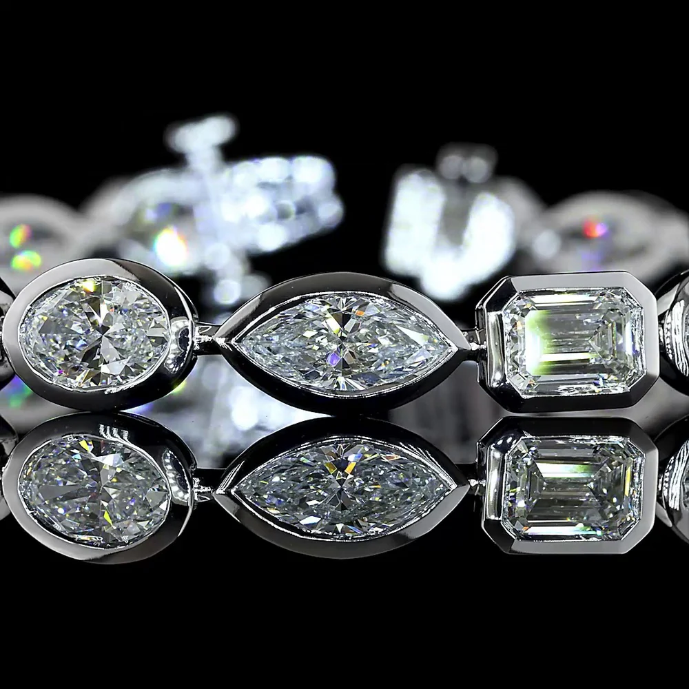 14K White Gold Mixed Shape Tennis Bracelet with Oval, Emerald, and Marquise Lab Diamonds in Bezel Setting - 12.39 Carats Total Diamond Weight - Covaloro Fine Jewelry - Image 3
