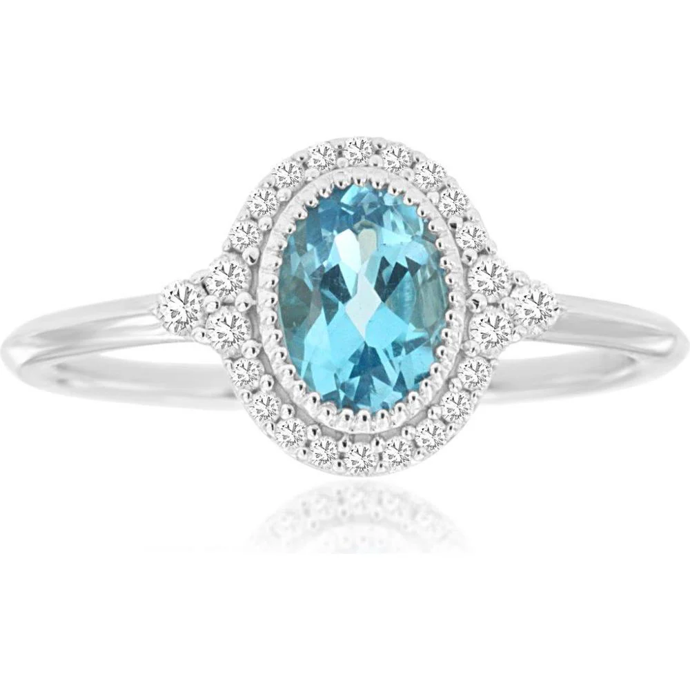 14K White Gold Oval Blue Topaz and Diamond Halo Ring with Milgrain Detail - 0.90 Carat Blue Topaz and 0.16 Carat Diamond Total Weight - Royal Jewelry