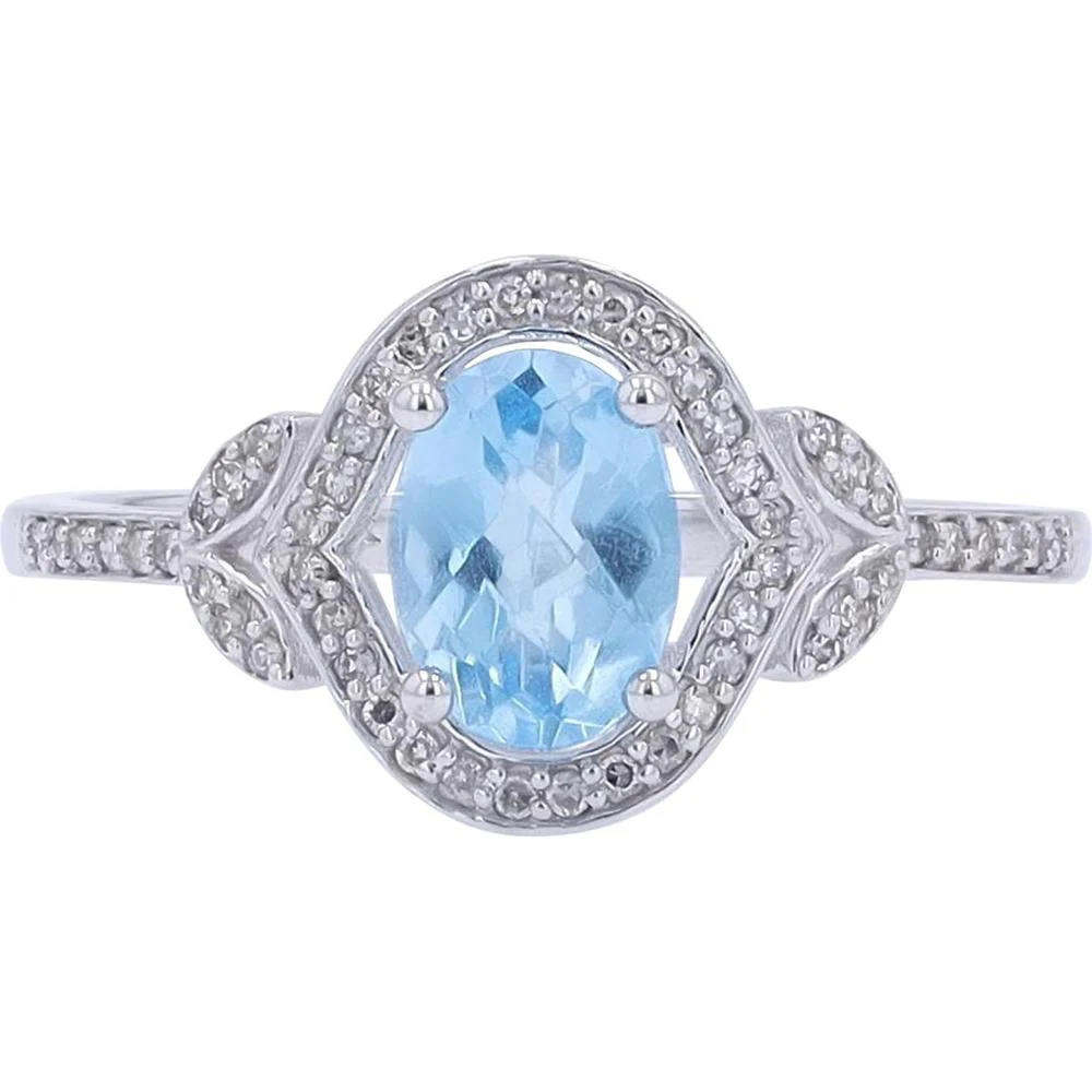 14K White Gold Oval Blue Topaz Ring with 0.13 Carat Diamond Halo