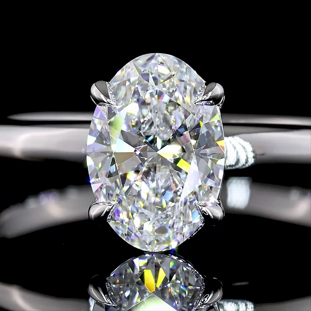 14K White Gold Oval Cut Lab Diamond Solitaire Ring - D VVS2 Clarity, IGI Certified, 1.03 Carat Total Weight, North-South Prong Setting - Covaloro Fine Jewelry - Image 2