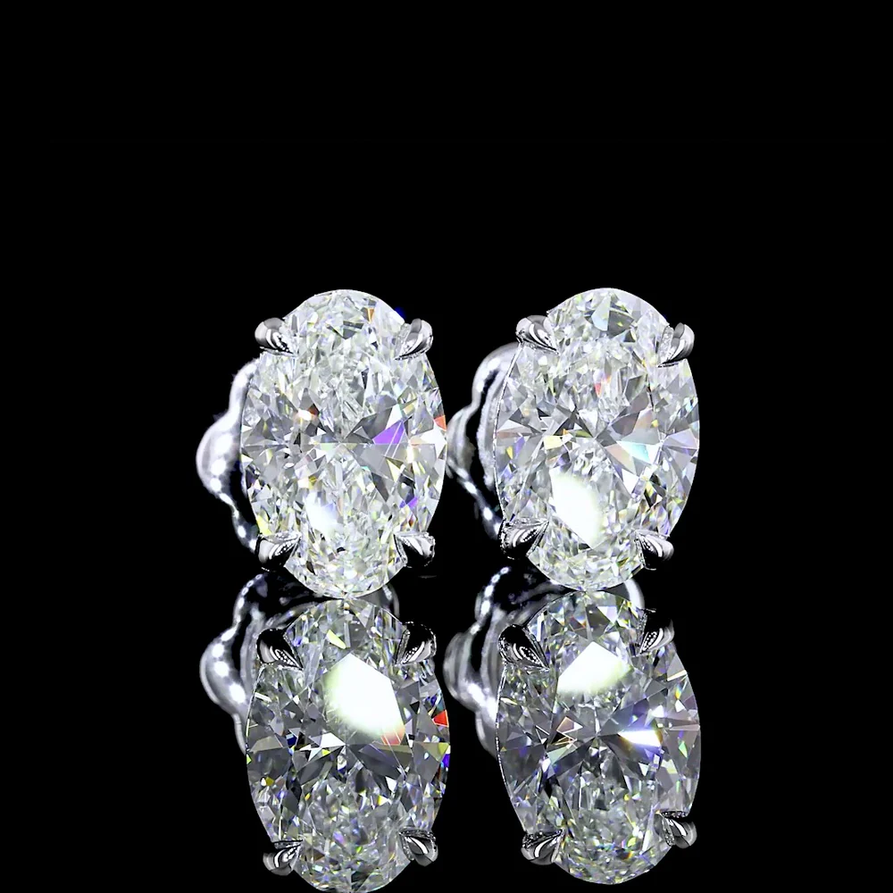 14K White Gold Oval Cut Lab Diamond Stud Earrings - 2.55 Carat Total Weight with Prong Setting and VVS2 Clarity - Covaloro Fine Jewelry - Image 2