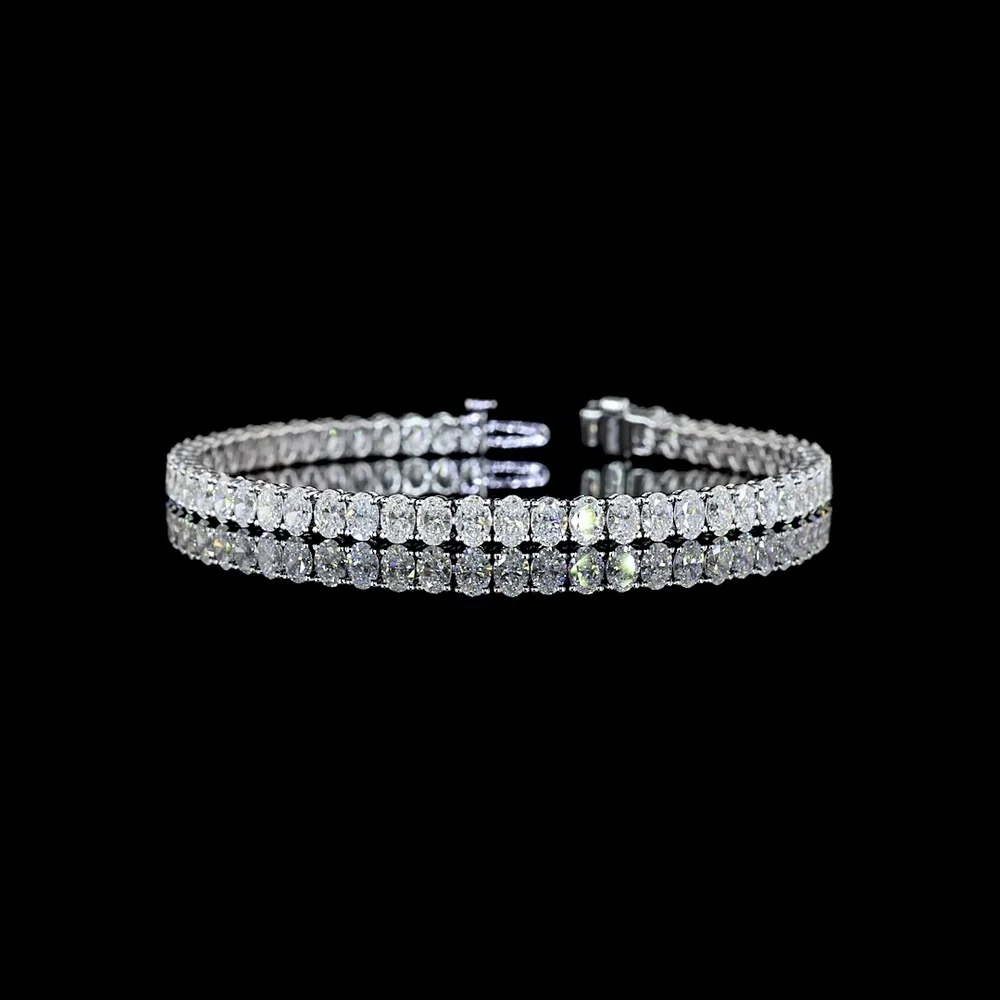 14K White Gold Oval Cut Lab Diamond Tennis Bracelet - 8.68 Carats Total Diamond Weight, 56 Stones E-F Color VS1 Clarity, Prong Set North-South Orientation - Covaloro Fine Jewelry