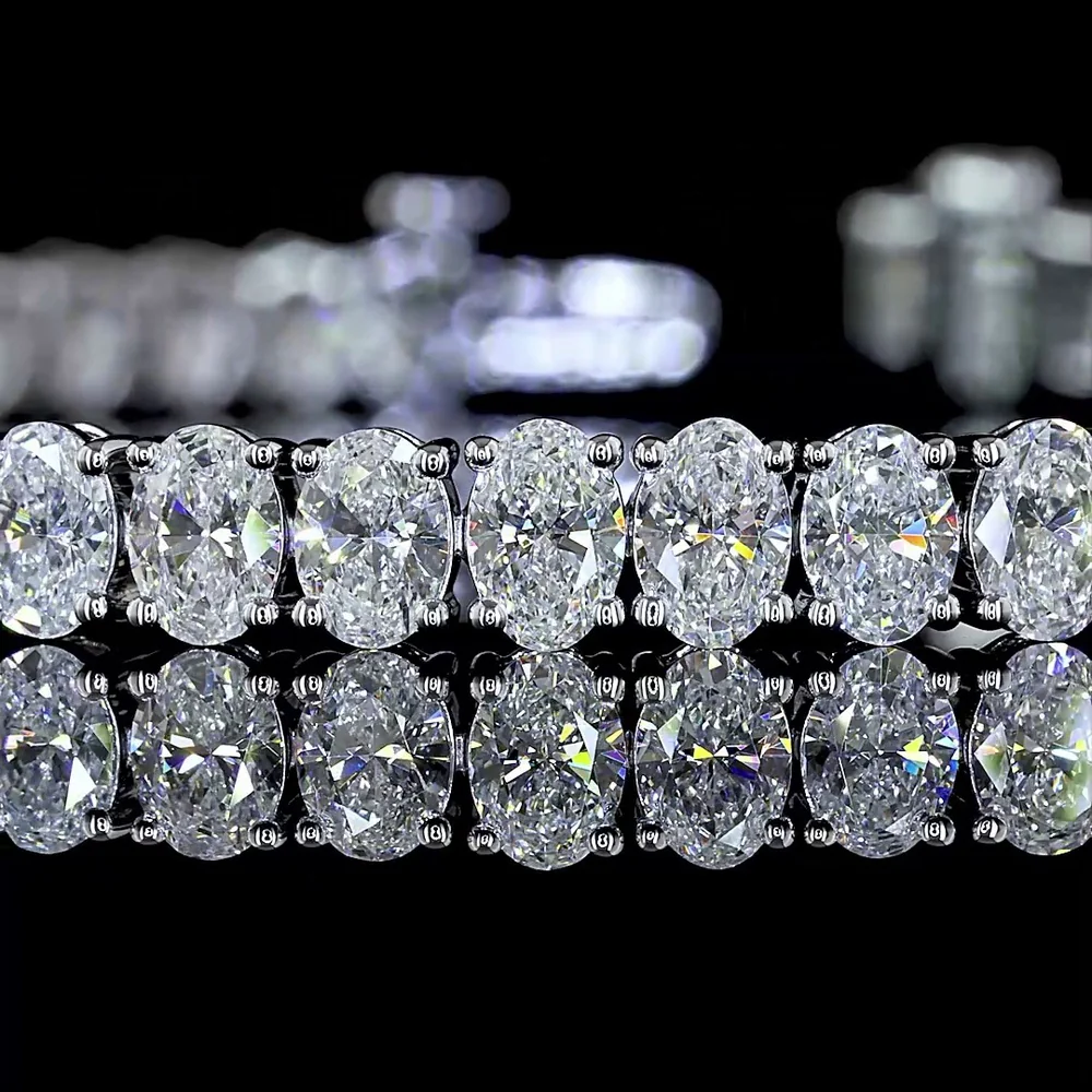 14K White Gold Oval Cut Lab Diamond Tennis Bracelet - 8.68 Carats Total Diamond Weight, 56 Stones E-F Color VS1 Clarity, Prong Set North-South Orientation - Covaloro Fine Jewelry - Image 2