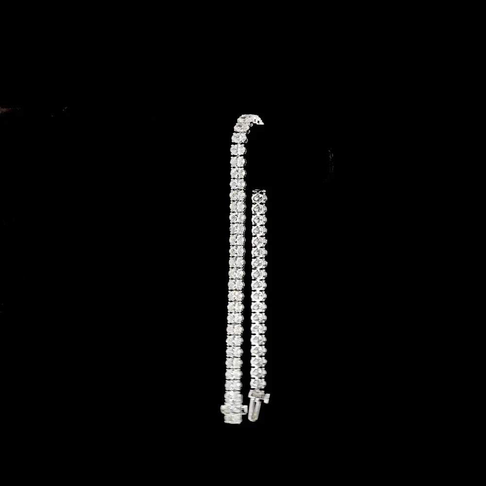 14K White Gold Oval Cut Lab Diamond Tennis Bracelet - 8.68 Carats Total Diamond Weight, 56 Stones E-F Color VS1 Clarity, Prong Set North-South Orientation - Covaloro Fine Jewelry - Image 3
