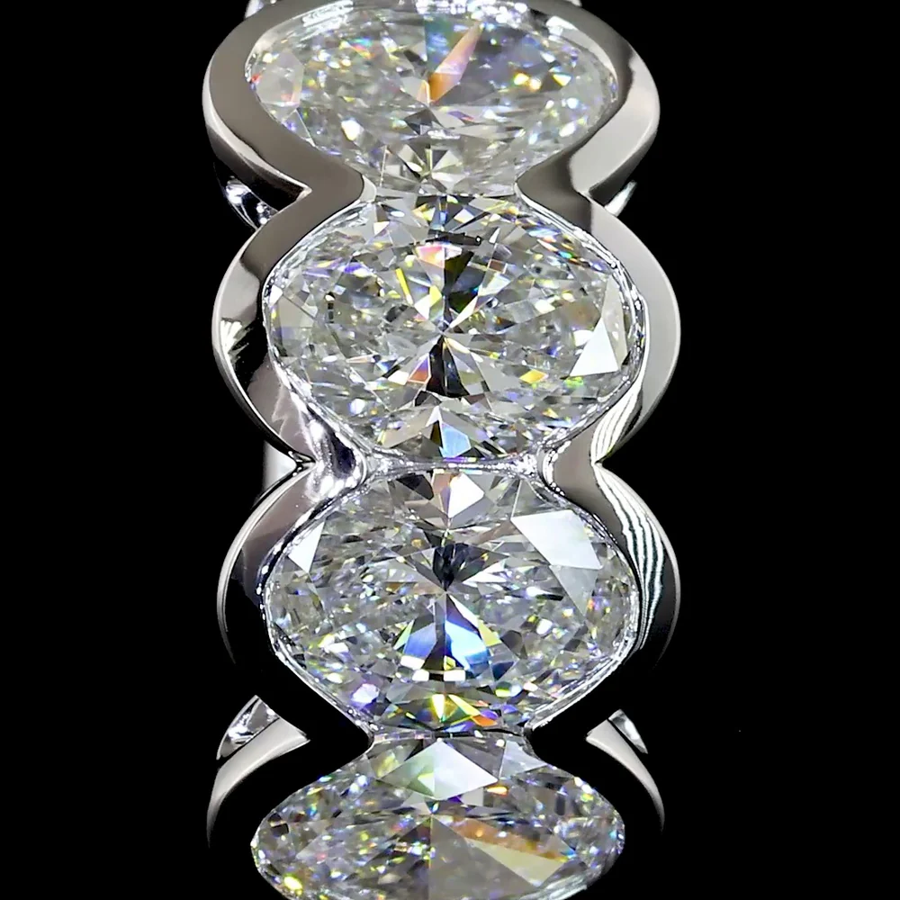 14K White Gold Oval Cut Lab-Grown Diamond Huggie Earrings with Half Bezel Setting - 2.08 Carats Total Diamond Weight - Covaloro Fine Jewelry - Image 3