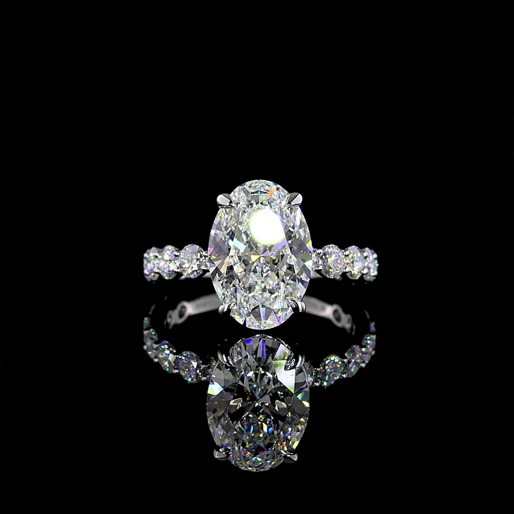 14K White Gold Oval Cut Solitaire Diamond Shank Ring - 5.47 Carat Total Diamond Weight (4.07 Carat Center D VVS2 Lab Diamond) with Brilliant Cut Side Diamonds - IGI Certified - Covaloro Fine Jewelry