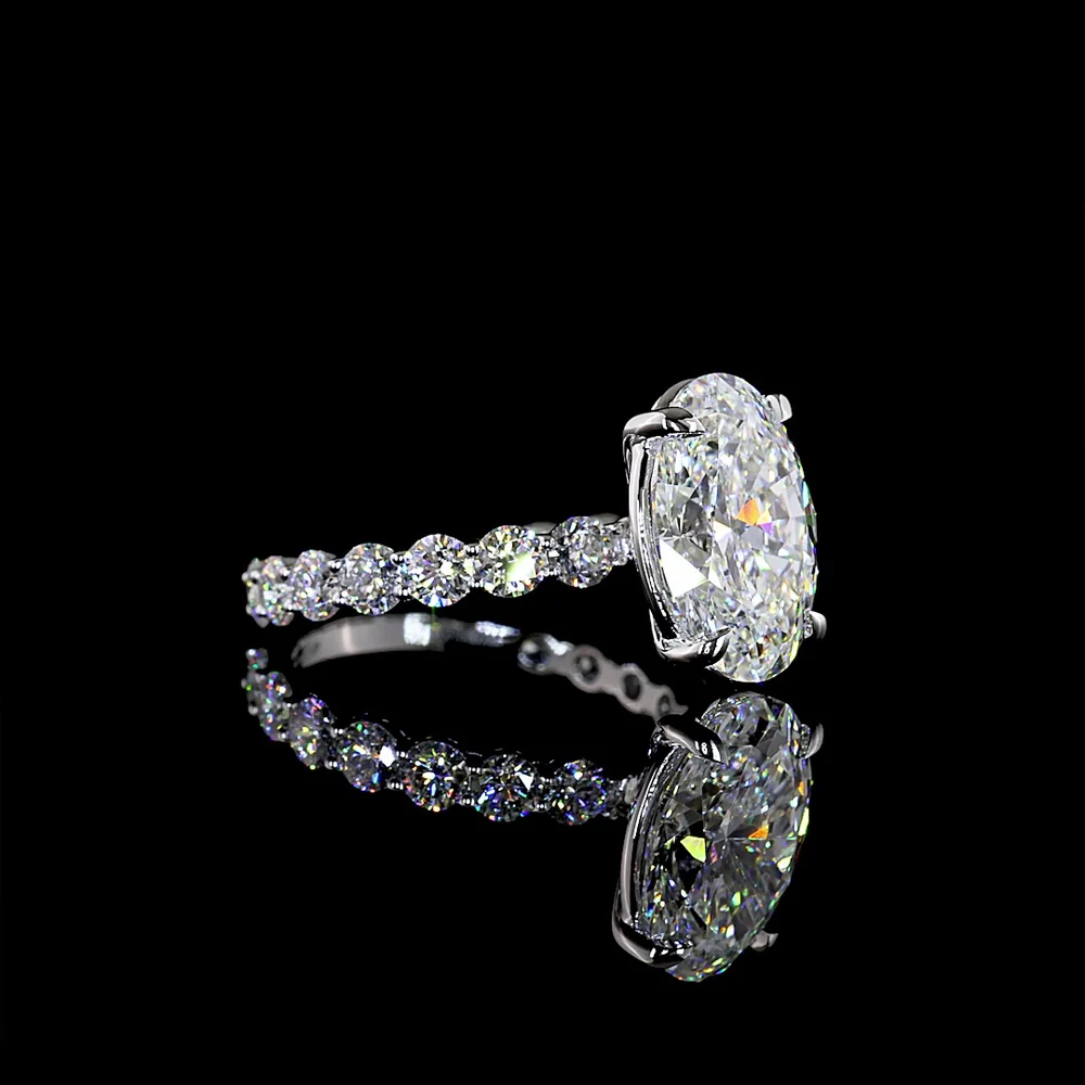 14K White Gold Oval Cut Solitaire Diamond Shank Ring - 5.47 Carat Total Diamond Weight (4.07 Carat Center D VVS2 Lab Diamond) with Brilliant Cut Side Diamonds - IGI Certified - Covaloro Fine Jewelry - Image 2