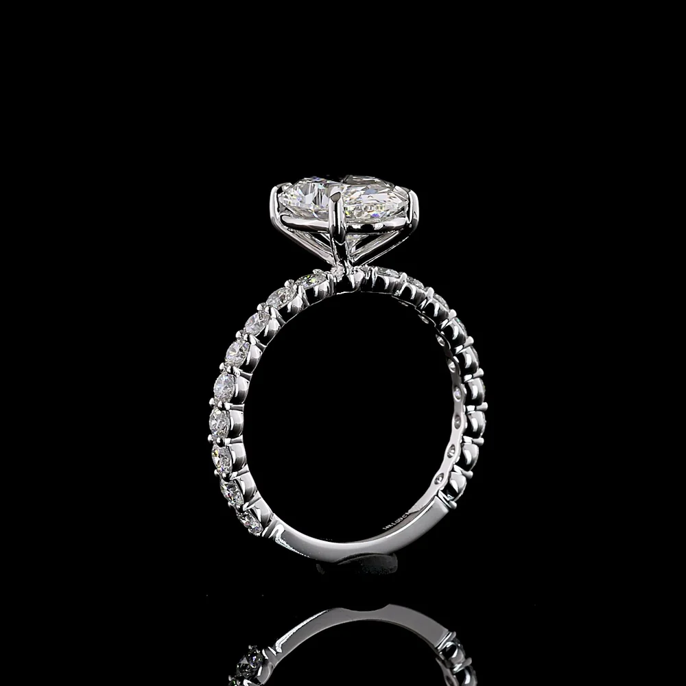 14K White Gold Oval Cut Solitaire Diamond Shank Ring with D VVS2 Center and Graduated Brilliant Side Stones - 3.95 Carat Total Weight (IGI Certified) - Covaloro Fine Jewelry - Image 4
