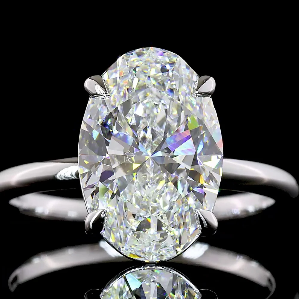 14K White Gold Oval Lab Diamond Solitaire Ring - 4.10 Carat E-F VVS2 North-South Setting with IGI Certification - Covaloro Fine Jewelry - Image 2