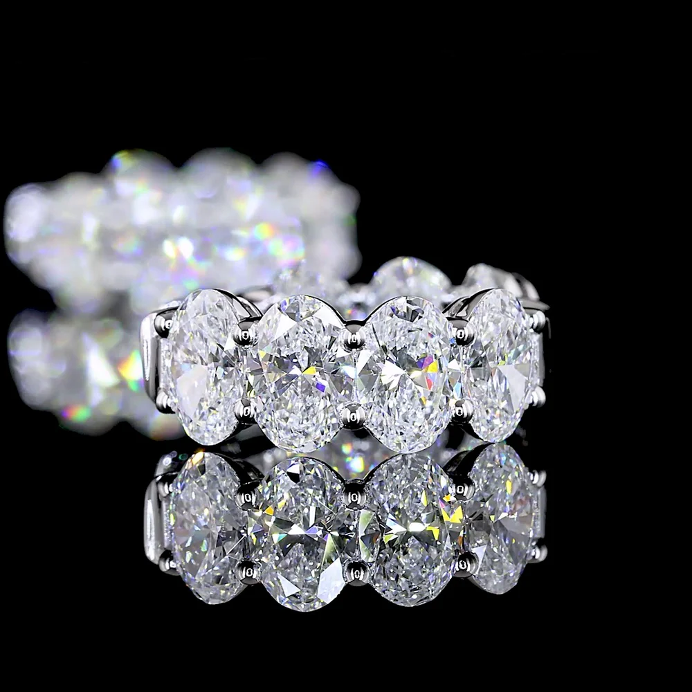 14K White Gold Oval Shaped Huggie Earrings with 14 Prong Set Oval Cut Lab Diamonds - 3.99 Carats Total Diamond Weight - Covaloro Fine Jewelry - Image 4