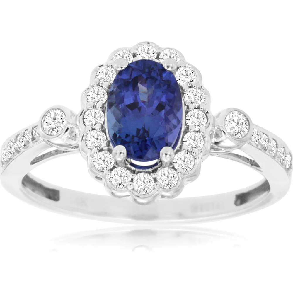 14K White Gold Oval Tanzanite and Diamond Halo Ring with Bezel and Pavé Accents - 0.85 Carat Tanzanite, 0.34 Carat Diamond Total Weight - Royal Jewelry