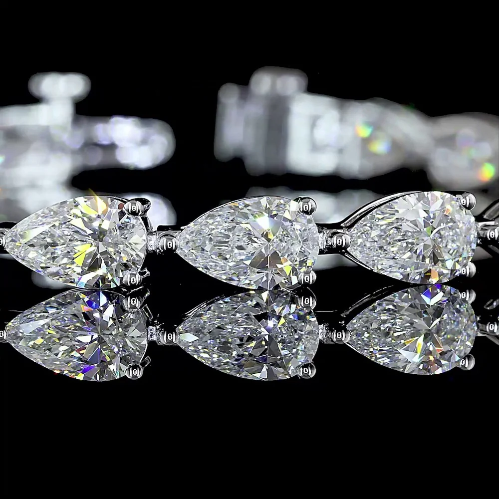 14K White Gold Pear Shape East-West Tennis Bracelet with Prong Set Lab Grown E-F VS1 Diamonds - 12.24 Carat Total Weight - Covaloro Fine Jewelry - Image 2