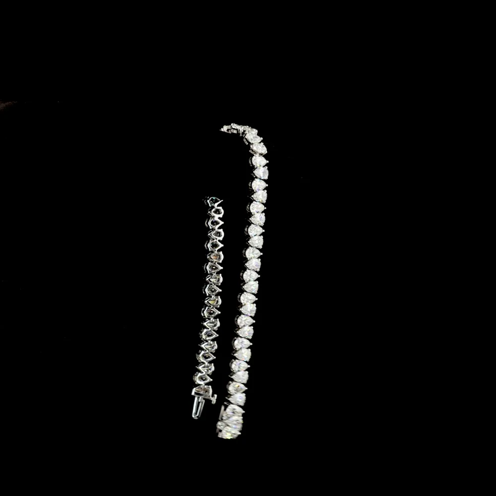 14K White Gold Pear-Shape Lab Diamond Tennis Bracelet - 54 Stones, 14.13 Total Carat Weight, E-F VS Clarity - Covaloro Fine Jewelry - Image 3