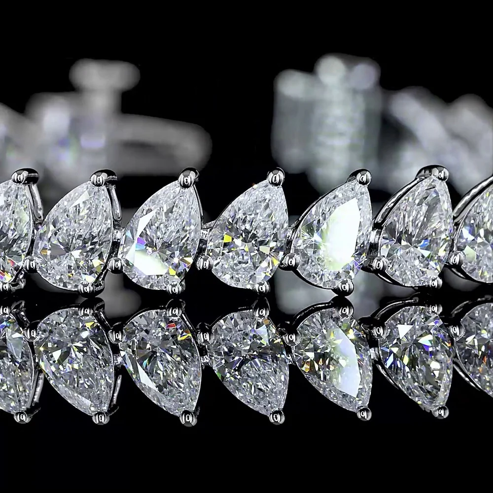 14K White Gold Pear Shape Tennis Bracelet with Incline-Set Lab Grown Diamonds (E-F VS1) - 8.69 Carat Total Weight - Covaloro Fine Jewelry - Image 2