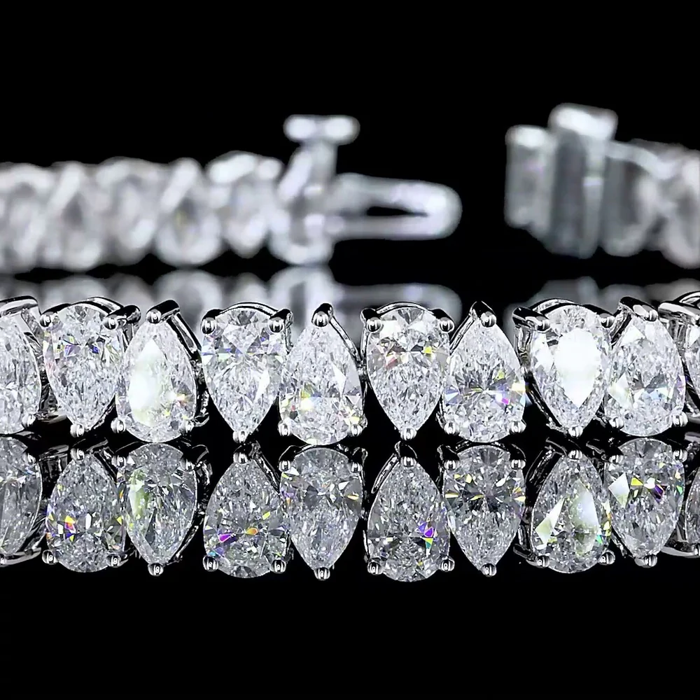 14K White Gold Pear Shape Tennis Bracelet with North-South Prong Set Lab Diamonds - 10.52 Carat Total Weight - Covaloro Fine Jewelry - Image 2