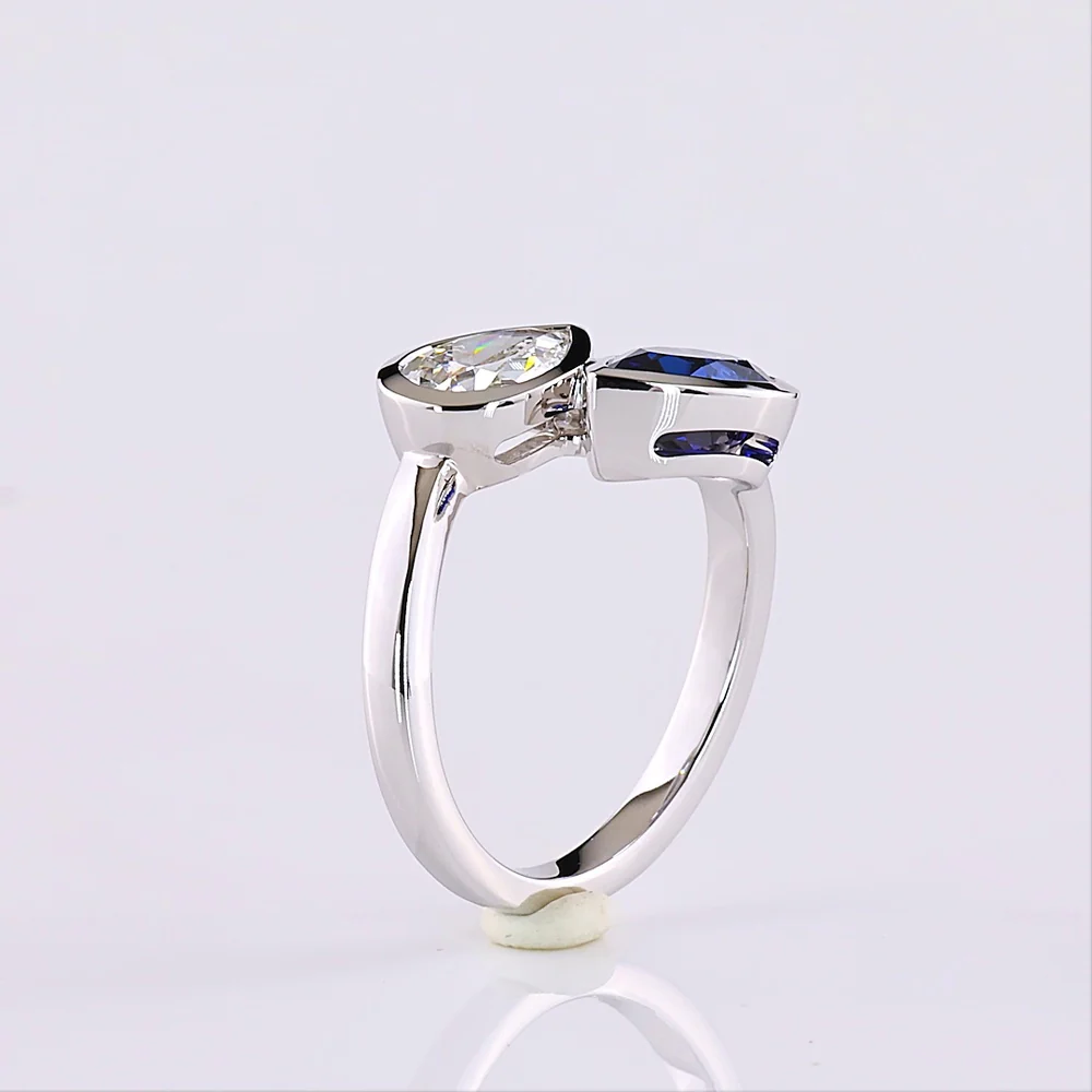 14K White Gold Pear Shape Toi et Moi Ring with Bezel Set Lab-Grown Blue Sapphire and Lab-Grown Diamond - 2.42 Carats Total Gem Weight - Covaloro Fine Jewelry - Image 4