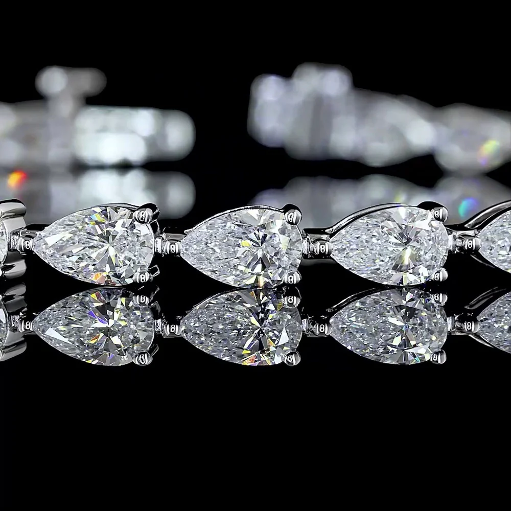 14K White Gold Pear-Shaped Lab Diamond Tennis Bracelet with East-West Prong Setting - 6.52 Carat Total Weight - Covaloro Fine Jewelry - Image 2