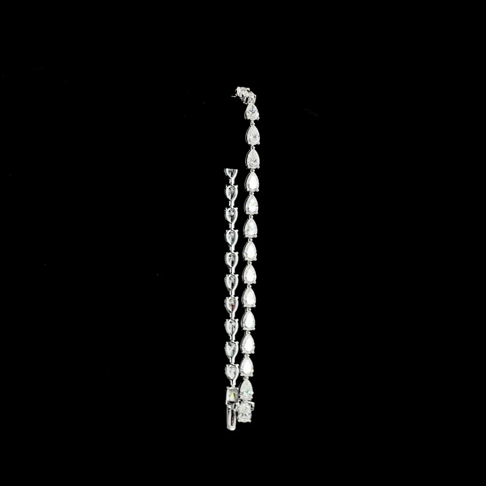 14K White Gold Pear-Shaped Lab Diamond Tennis Bracelet with East-West Prong Setting - 6.52 Carat Total Weight - Covaloro Fine Jewelry - Image 3