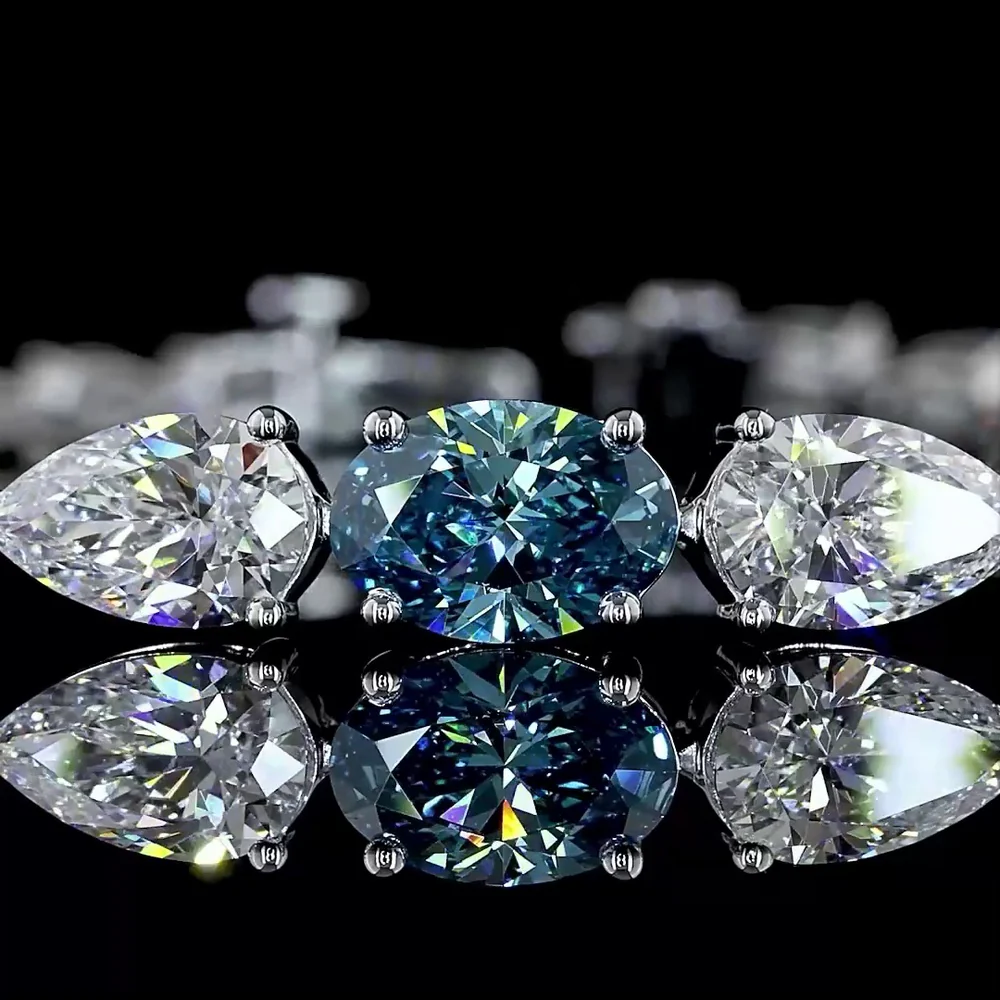 14K White Gold Riviera Bracelet with 1.01 Carats Fancy Vivid Blue Oval Lab Diamond and Pear Shape White Diamonds - 8.35 Carats Total Diamond Weight - Covaloro Fine Jewelry - Image 2