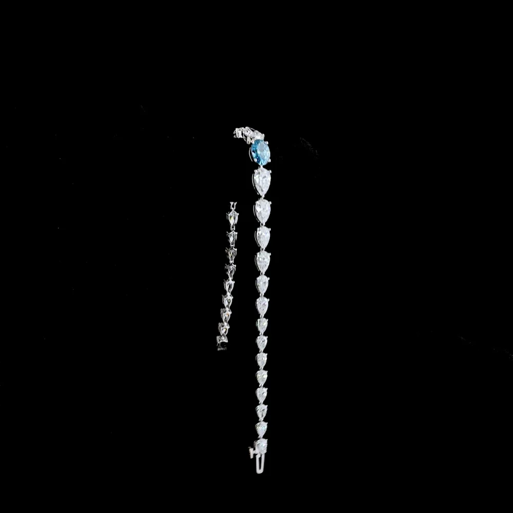 14K White Gold Riviera Bracelet with 1.01 Carats Fancy Vivid Blue Oval Lab Diamond and Pear Shape White Diamonds - 8.35 Carats Total Diamond Weight - Covaloro Fine Jewelry - Image 3