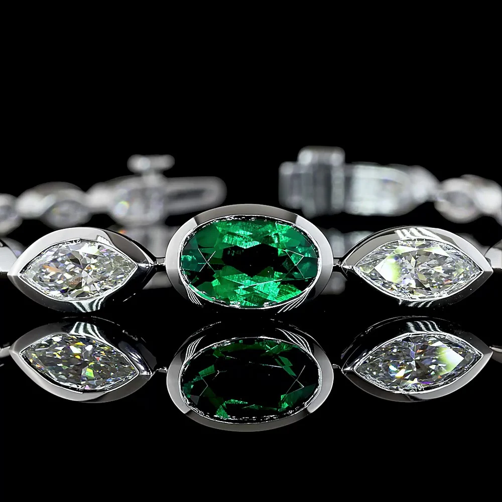 14K White Gold Riviera Bracelet with 1.83 Carats Oval Lab Emerald and Marquise Cut Lab Diamonds in Bezel Setting - 5.49 Total Carat Weight - Covaloro Fine Jewelry - Image 2