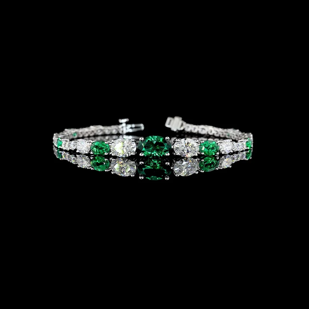 14K White Gold Riviera Bracelet with Alternating Oval Cut Lab-Grown Emerald and Diamond Accents - 5.92 Total Carat Weight - Covaloro Fine Jewelry