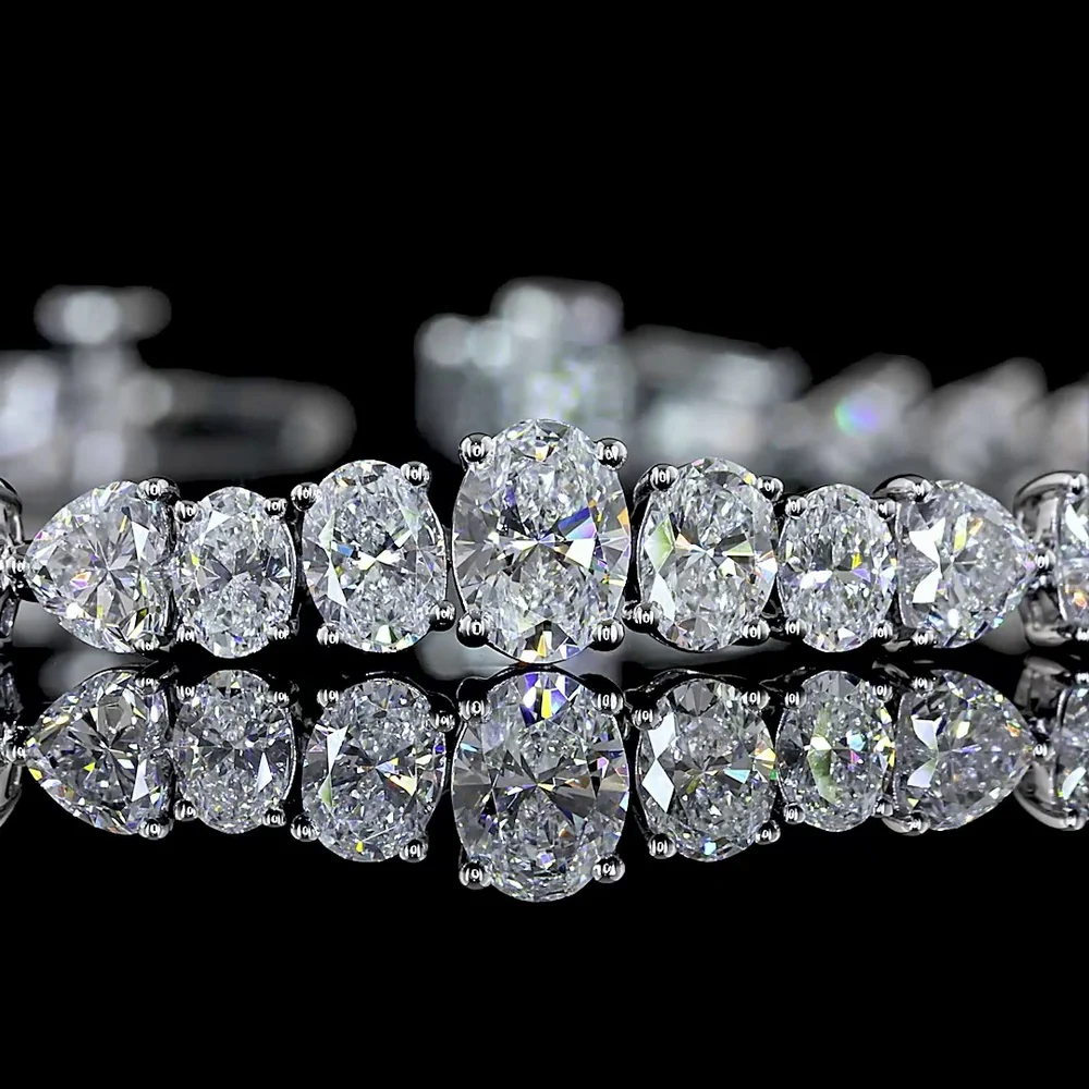 14K White Gold Riviera Tennis Bracelet with Oval and Heart Cut Lab Grown Diamonds in Prong Setting - 6.96 Carat Total Diamond Weight - Covaloro Fine Jewelry - Image 2