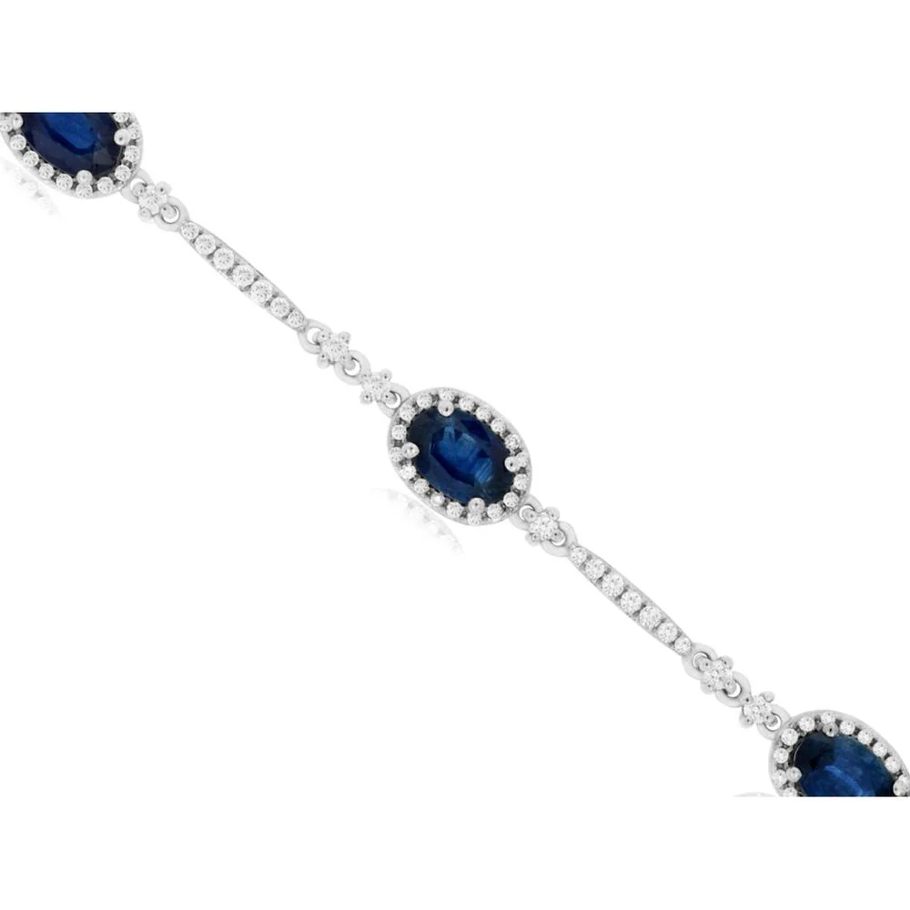 14K White Gold Station Bracelet with Oval Sapphires and Diamond Halos - 4.30 Carat Total Sapphire Weight, 0.90 Carat Total Diamond Weight - Royal Jewelry
