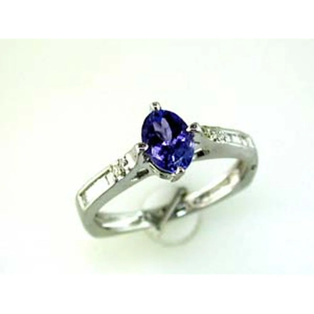 14K White Gold Tanzanite Oval & Diamond Baguette Ring - 0.93 Carats Total Gem Weight - Royal Jewelry