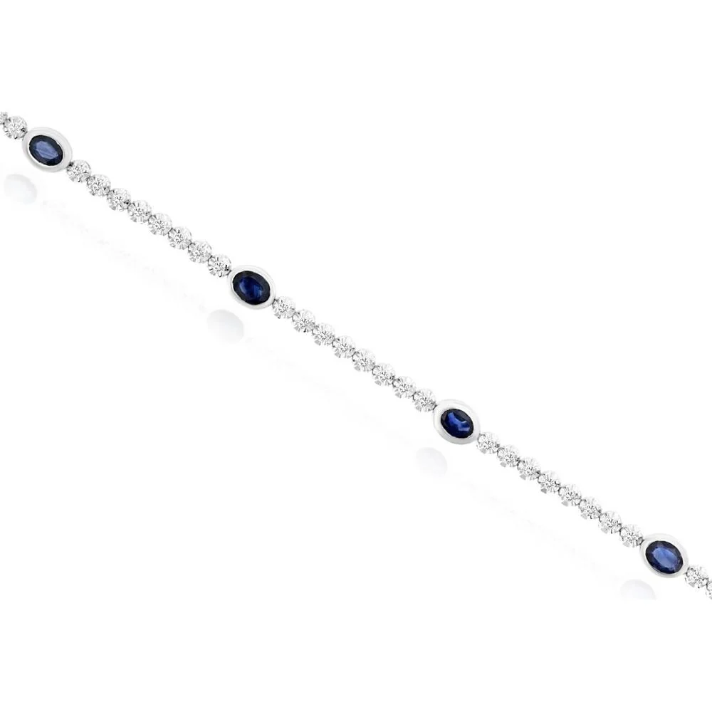 14K White Gold Tennis Bracelet with Bezel-Set Oval Sapphires and Round Diamonds - 1.80 Total Carat Weight (1.25 Carat Sapphire, 0.55 Carat Diamond) - Royal Jewelry