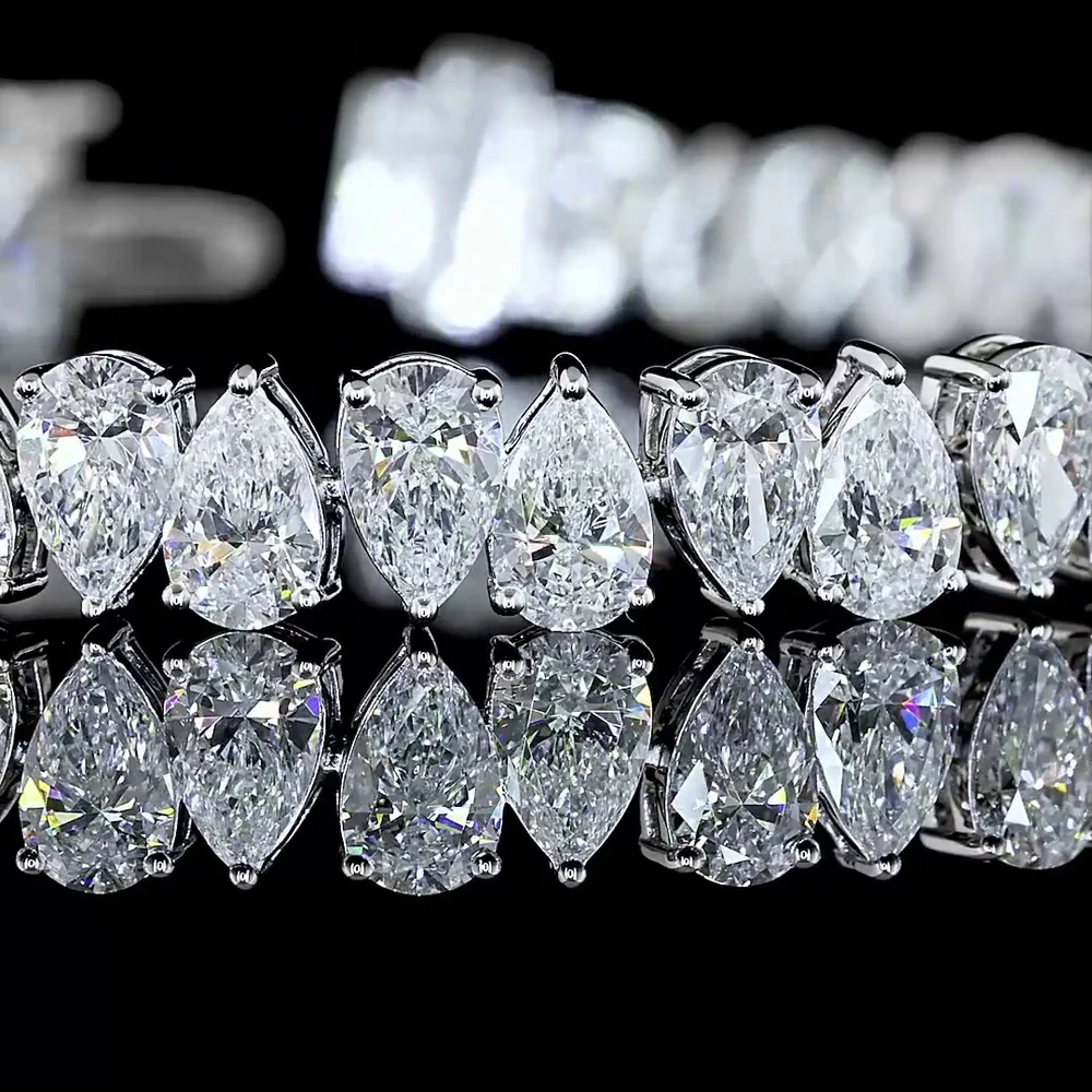 14K White Gold Tennis Bracelet with North-South Pear Shape Lab Diamonds - 13.09 Carat Total Diamond Weight, E-F VS Clarity - Covaloro Fine Jewelry - Image 2
