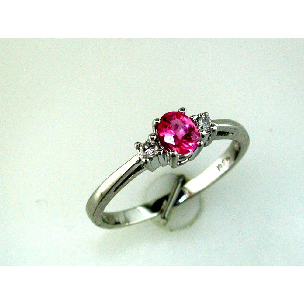 14K White Gold Three-Stone Ring with 0.45 Carat Oval Pink Sapphire and 0.08 Carat Round Diamond Accents - Royal Jewelry