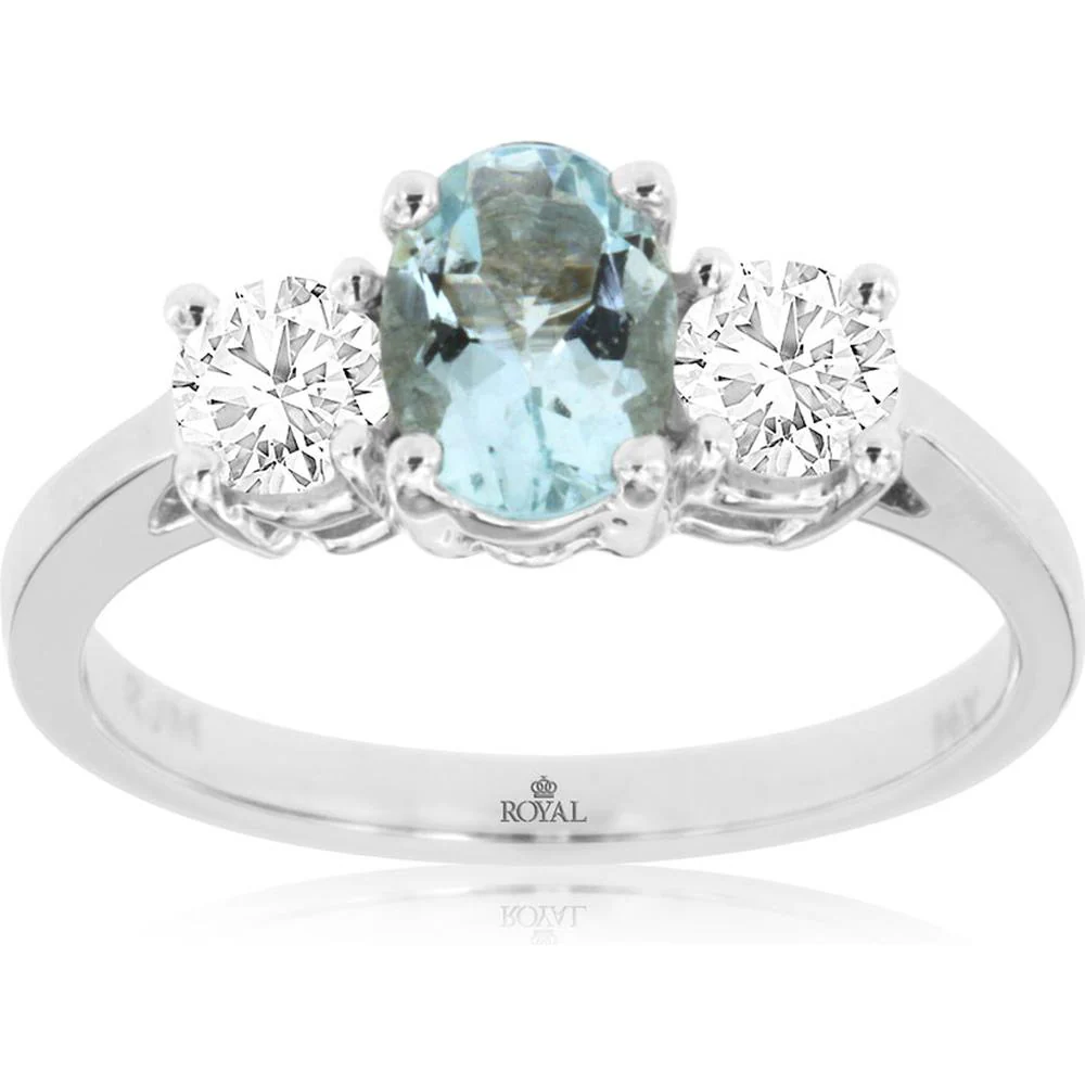 14K White Gold Three-Stone Ring with 0.68 Carat Oval Aquamarine and 0.50 Carat Total Weight Round Diamonds - Royal Jewelry