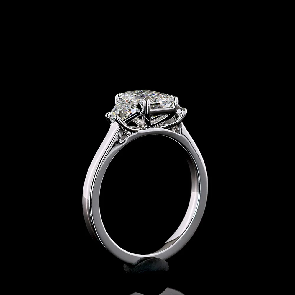 14K White Gold Three Stone Ring with 1.27 Carat Emerald Cut Lab Diamond and 0.50 Carat Trapezoid Side Stones - 1.77 Carat Total Diamond Weight D VVS1 IGI Certified - Covaloro Fine Jewelry - Image 4