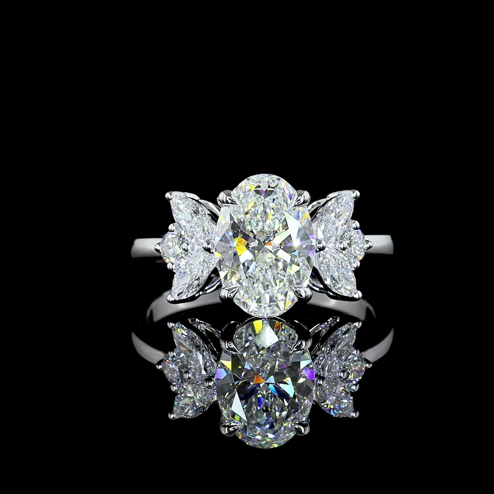 14K White Gold Three-Stone Ring with 2.03 Carats Oval Lab Diamond, Marquise and Round Side Stones - 2.62 Carats Total Diamond Weight - Covaloro Fine Jewelry