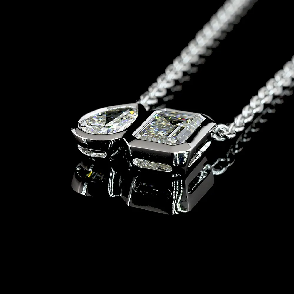 14K White Gold Toi et Moi Pendant with 1.10 Carat Emerald Cut and 0.48 Carat Pear Shape Lab Diamonds - 1.58 Carat Total Weight in Bezel Setting - Covaloro Fine Jewelry - Image 4