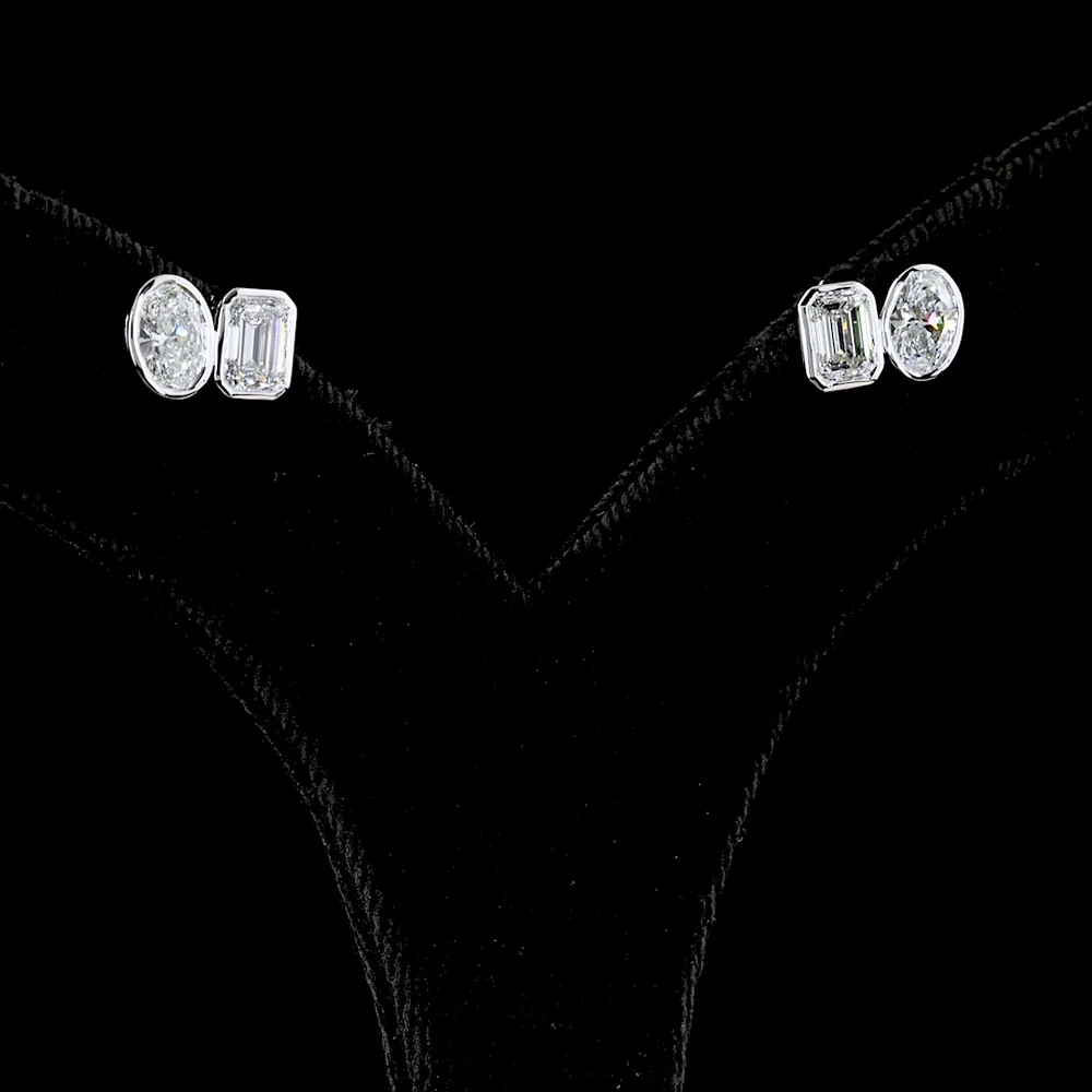 14K White Gold Toi et Moi Stud Earrings with Bezel Set Emerald Cut and Oval Cut Lab Diamonds - 2.05 Carat Total Diamond Weight - Covaloro Fine Jewelry