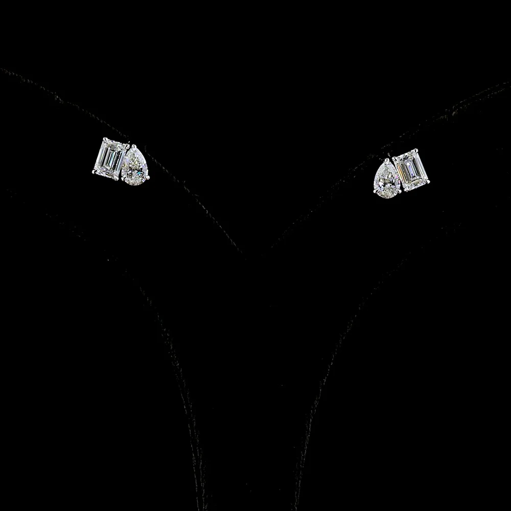 14K White Gold Two Stone Stud Earrings with Emerald Cut and Pear Shape Lab Diamonds - 1.79 Carats Total Diamond Weight - Covaloro Fine Jewelry