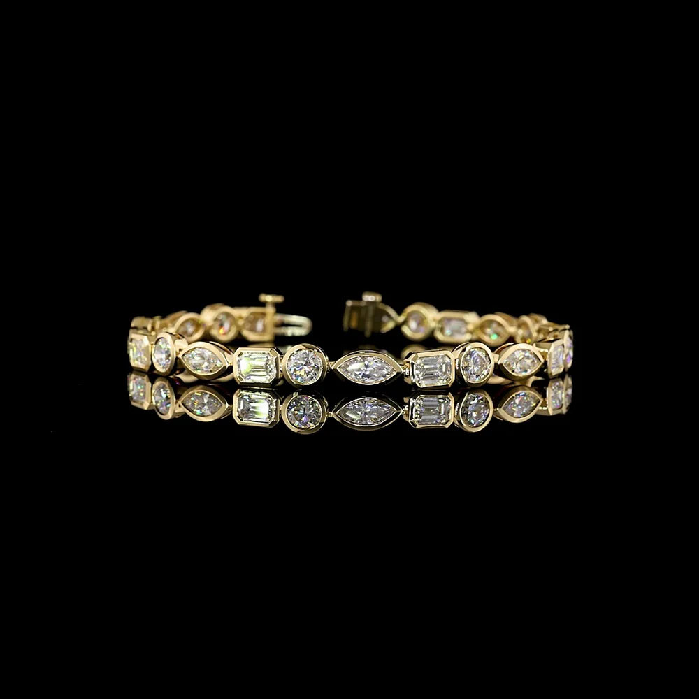 14K Yellow Gold 10 Carat Tennis Bracelet with Alternating Marquise, Emerald, and Round Cut Lab Diamonds in Bezel Settings - E-F Color, VS Clarity - Covaloro Fine Jewelry