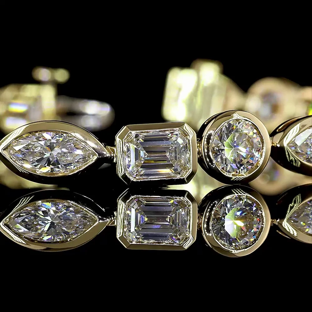 14K Yellow Gold 10 Carat Tennis Bracelet with Alternating Marquise, Emerald, and Round Cut Lab Diamonds in Bezel Settings - E-F Color, VS Clarity - Covaloro Fine Jewelry - Image 2