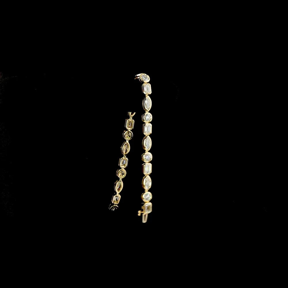 14K Yellow Gold 10 Carat Tennis Bracelet with Alternating Marquise, Emerald, and Round Cut Lab Diamonds in Bezel Settings - E-F Color, VS Clarity - Covaloro Fine Jewelry - Image 3