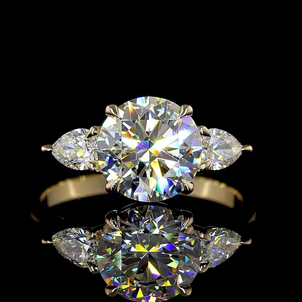 14K Yellow Gold 3-Stone Ring with 2.27 Carats Round Brilliant E VVS2 Lab Diamond and 0.44 Carats Pear Shape Side Stones - 2.71 Total Carat Weight - Covaloro Fine Jewelry - Image 2