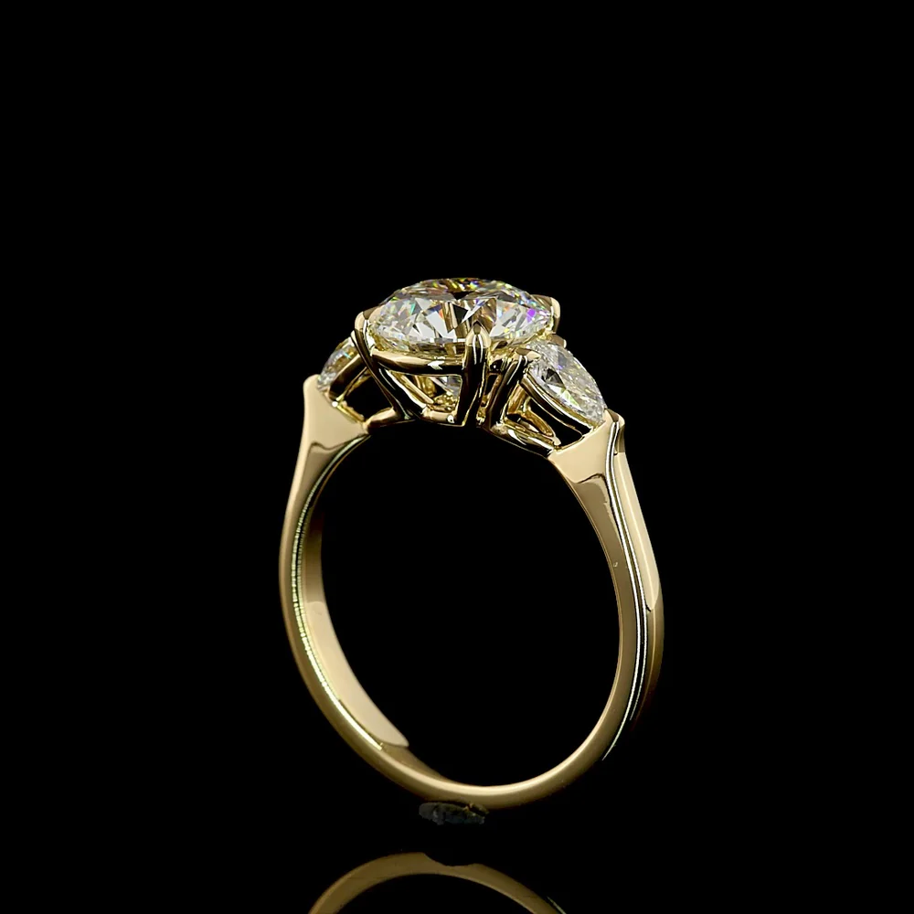 14K Yellow Gold 3-Stone Ring with 2.27 Carats Round Brilliant E VVS2 Lab Diamond and 0.44 Carats Pear Shape Side Stones - 2.71 Total Carat Weight - Covaloro Fine Jewelry - Image 3