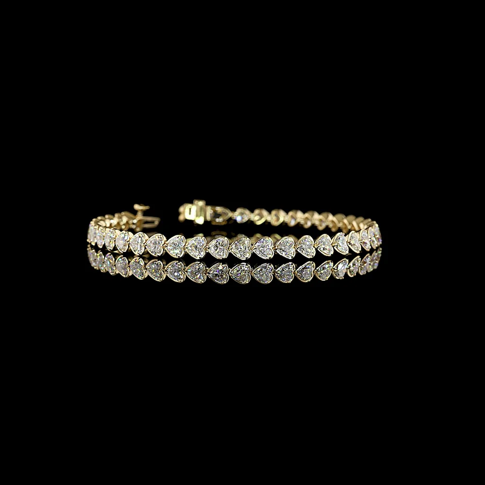14K Yellow Gold 7.5" Heart Shape Tennis Bracelet with East-West Bezel and Prong Set Lab Diamonds - 7.69 Carat Total Diamond Weight - Covaloro Fine Jewelry