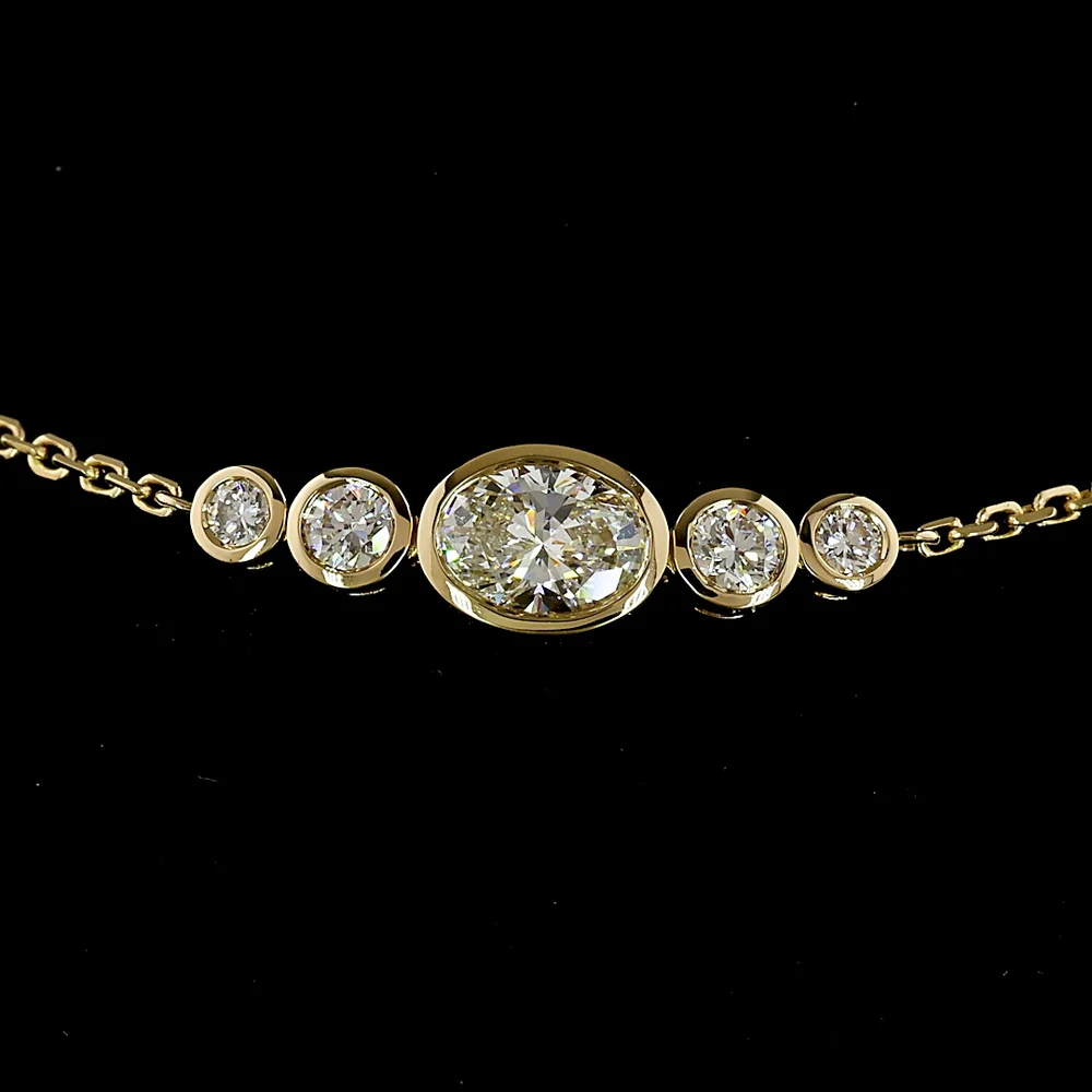 14K Yellow Gold 7.5" Station Bracelet with East-West Oval and Round Bezel Set Lab Diamonds - 0.99 Carat Total Diamond Weight - Covaloro Fine Jewelry - Image 2