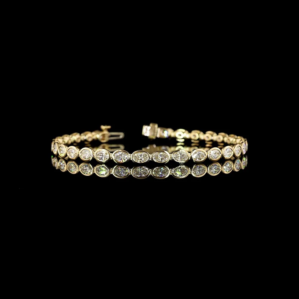 14K Yellow Gold 7.5" Tennis Bracelet with East-West Bezel Set Oval Cut Lab Diamonds (E-F VS1) - 5.40 Carat Total Diamond Weight - Covaloro Fine Jewelry