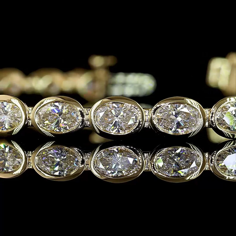 14K Yellow Gold 7.5" Tennis Bracelet with East-West Bezel Set Oval Cut Lab Diamonds (E-F VS1) - 5.40 Carat Total Diamond Weight - Covaloro Fine Jewelry - Image 2
