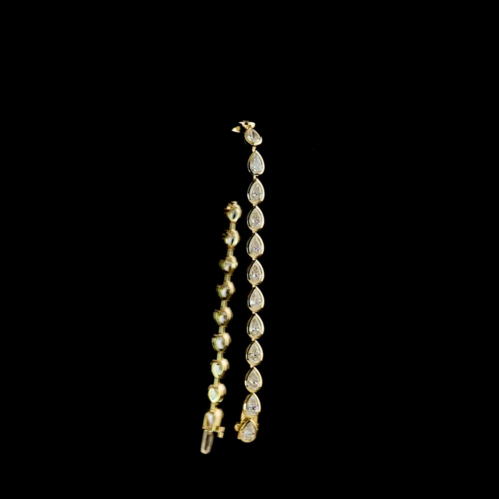 14K Yellow Gold 7.5" Tennis Bracelet with East-West Bezel Set Pear Shaped Lab Diamonds - 7.08 Carat Total Weight, E-F VS Clarity - Covaloro Fine Jewelry - Image 3