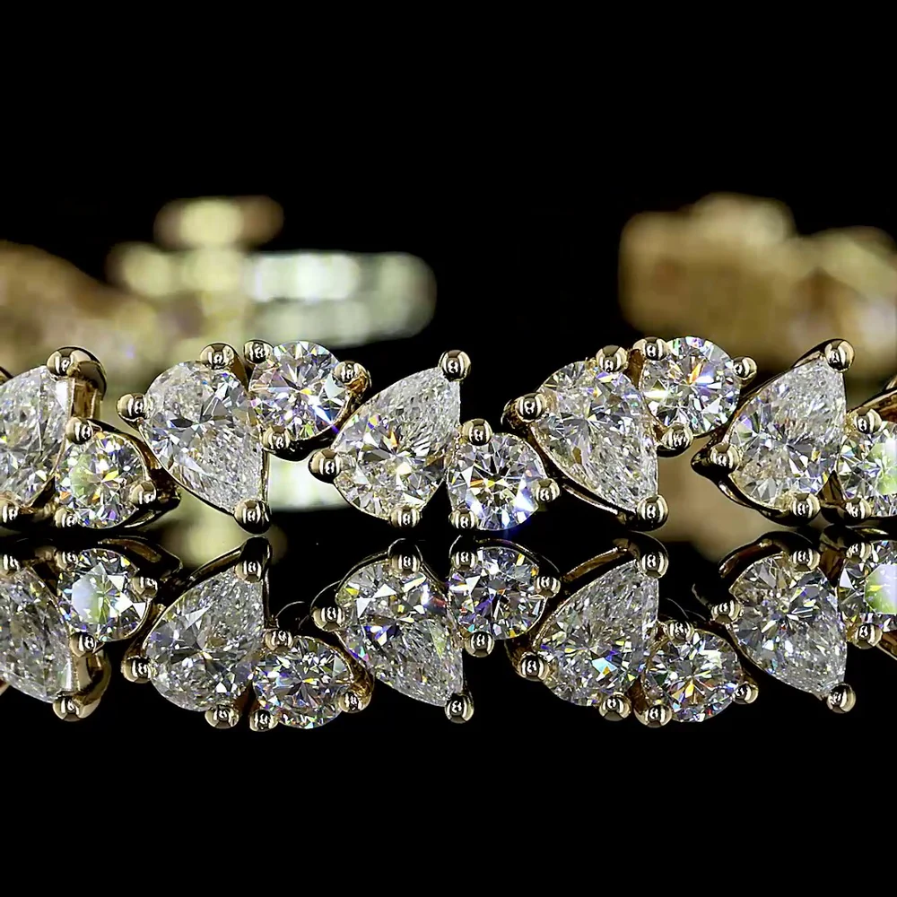14K Yellow Gold Alternating Pear and Round Lab Diamond Tennis Bracelet with Inclined Prong Setting - 5.80 Carats Total Diamond Weight - Covaloro Fine Jewelry - Image 2