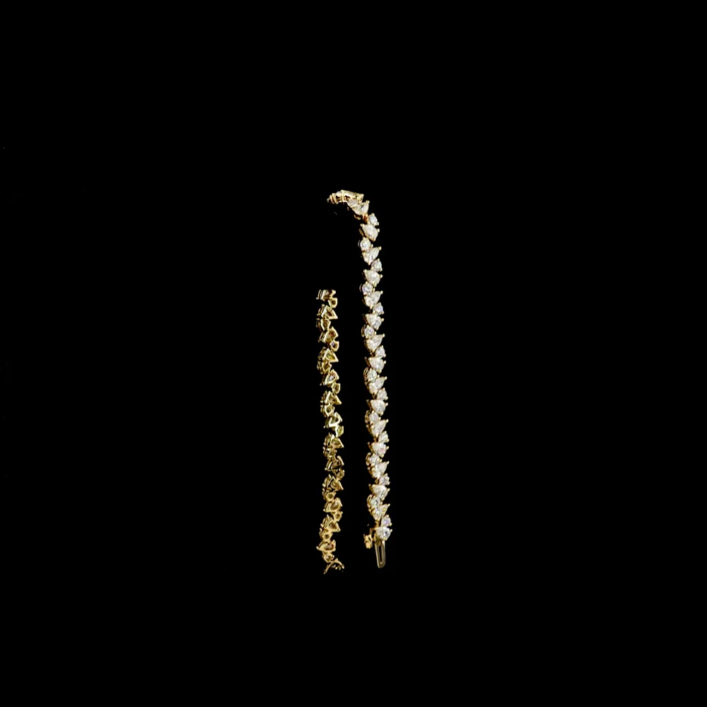 14K Yellow Gold Alternating Pear and Round Lab Diamond Tennis Bracelet with Inclined Prong Setting - 5.80 Carats Total Diamond Weight - Covaloro Fine Jewelry - Image 3